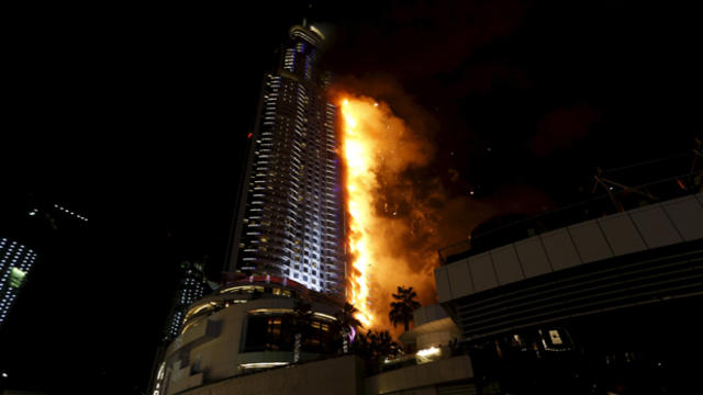 A fire engulfs The Address Hotel in downtown Dubai in the United Arab Emirates Dec. 31, 2015. 