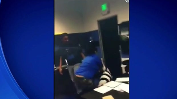 A still taken from cellphone video posted to Facebook shows a student being hit at a special education school in Antioch, California, Jan. 5, 2016. 