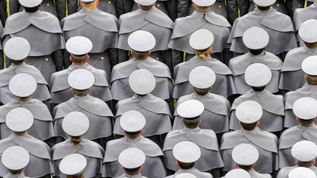 The cadets of West Point stand at attention during the ceremonial march on to the field before a game between the Army Black Nights and the Navy Midshipmen Dec. 14, 2013, at Lincoln Financial Field in Philadelphia, Pennsylvania. 
