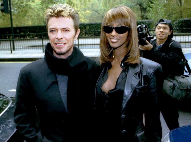 David Bowie and wife Iman in November 7, 1995 file photo 