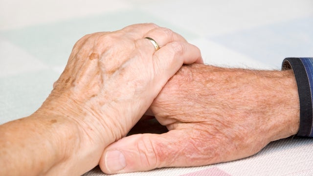older-couple-holding-hands.jpg 