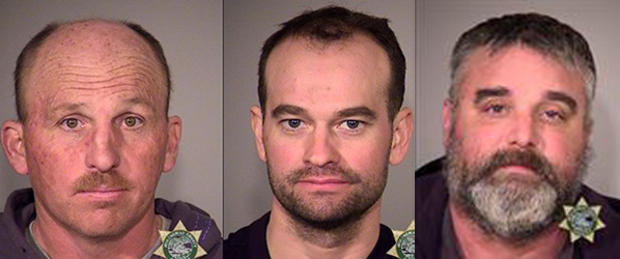 From left to right, Duane Leo Ehmer, 45, of Irrigon, Oregon, Dylan Wade Anderson, 34, of Provo, Utah, and Jason S. Patrick, 43, of Bonaire, Georgia, are seen in booking photos released by the Multnomah County Sheriff's Office in Oregon. 