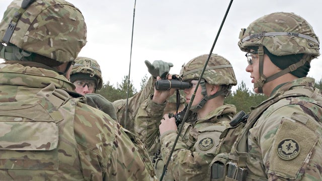 ​U.S. and Latvian soldiers observe a mortar training exercise at a base in Ādaži, Latvia 