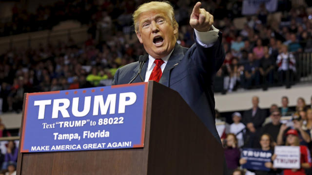 ​Republican presidential candidate Donald Trump speaks during a campaign stop in Tampa, Florida, Feb. 12, 2016. 