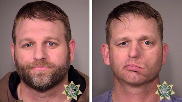 Ammon Bundy, left, and his brother, Ryan Bundy, are seen in a combination of police jail booking photos released by the Multnomah County Sheriff's Office in Portland, Oregon, Jan. 27, 2016. 
