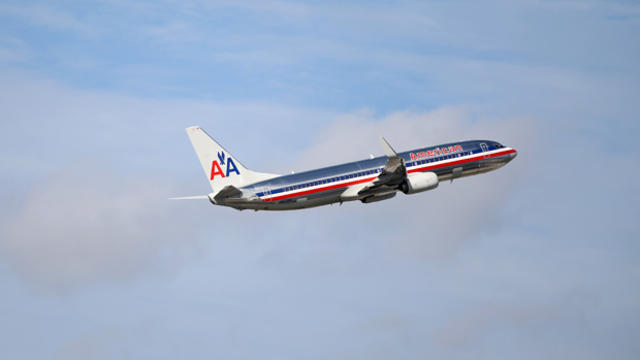 An American Airlines plane takes off from Miami International Airport on Nov. 12, 2013, in Miami, Florida. 