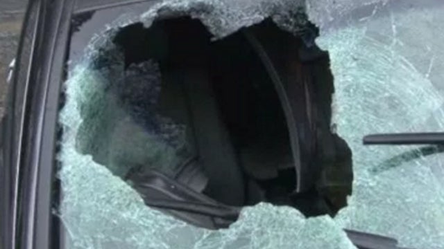 boulderthroughwindshield032116.jpg 