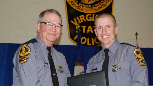 vsp-tpr-dermyer-receiving-his-graduation-diploma-from-vsp-col-w-steven-flaherty-nov-2014.jpg 
