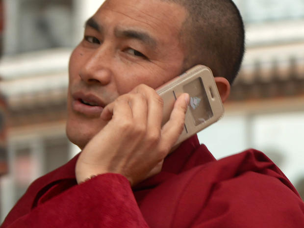 bhutan-bhutanese-man-on-cell-phone.jpg 