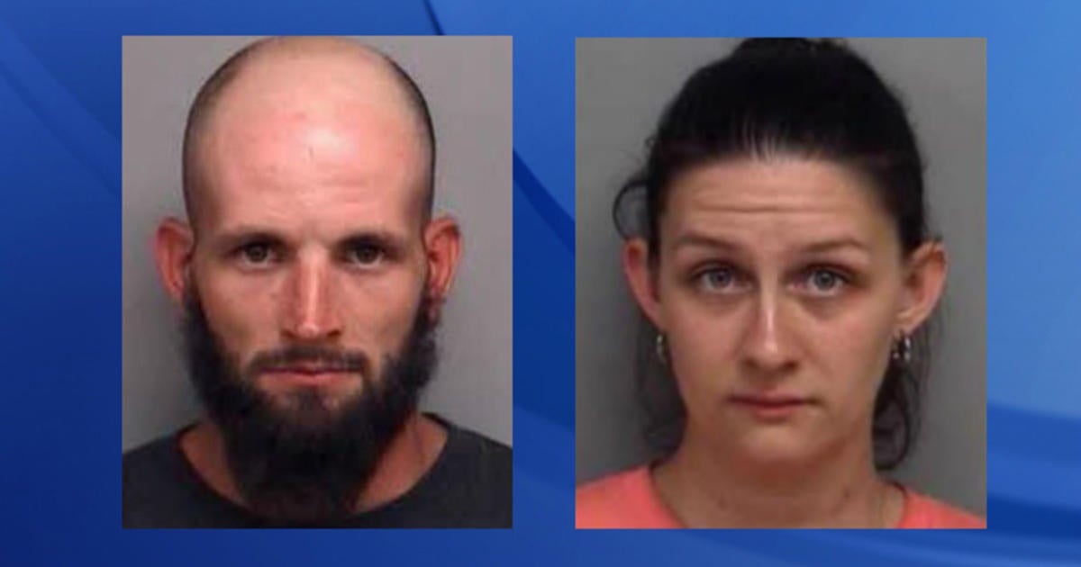 Parents arrested after missing toddler found in woods - CBS News