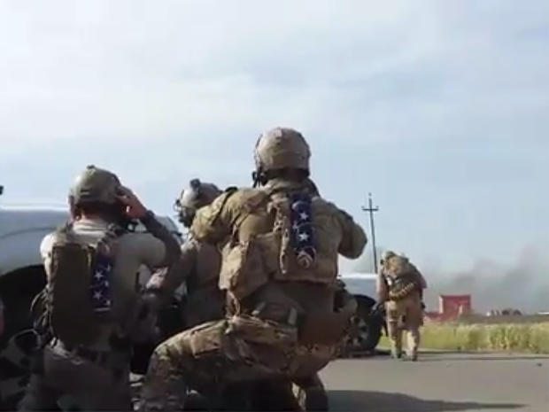 Video handed to The Guardian newspaper appears to show U.S. Navy SEALs engaged in a gun battle in Tel Asqof, Iraq, May 4, 2016, alongside Kurdish peshmerga forces, after coming under attack by ISIS militants 