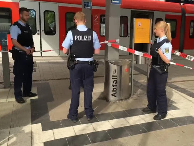 ​German police at the scene of a stabbing attack at the Grafing train station, near Munich in southern Germany 