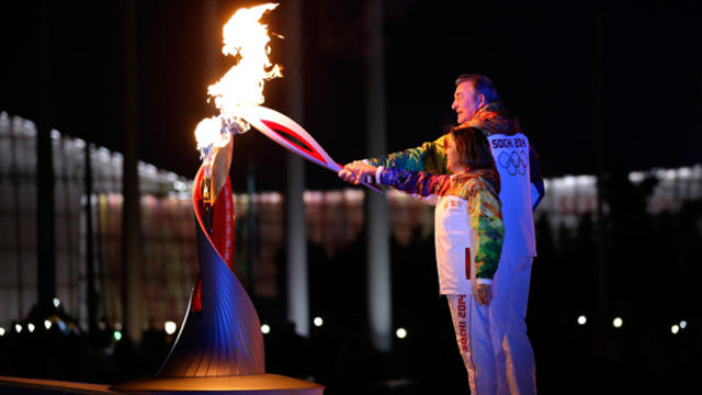 Vladislav Tretyak lights the Olympic cauldron during the opening ceremony of the 2014 Winter Olympics in Sochi, Russia, Feb. 7, 2014. 