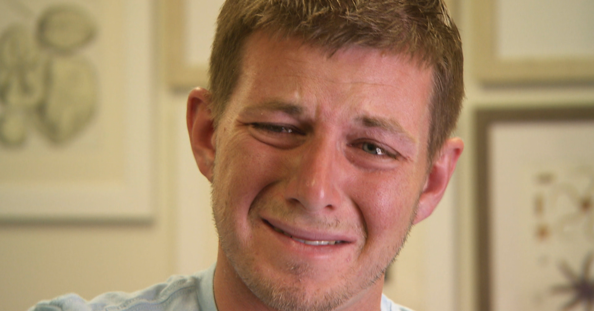 Heroin addict fights through emotional first days of rehab - CBS News