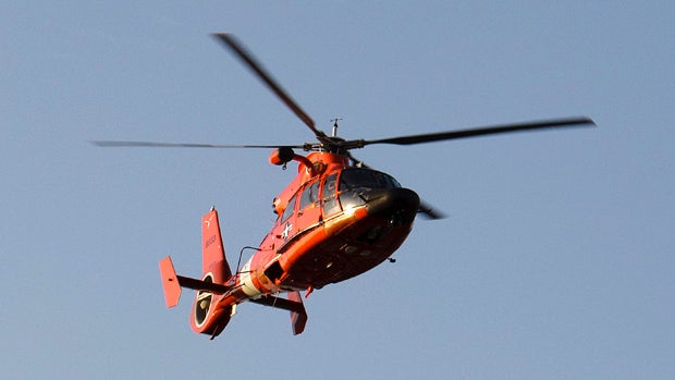 A U.S. Coast Guard helicopter performs a flyover before the Columbus Crew and the Houston Dynamo play during military appreciation night at Robertson Stadium on July 10, 2010, in Houston, Texas. 