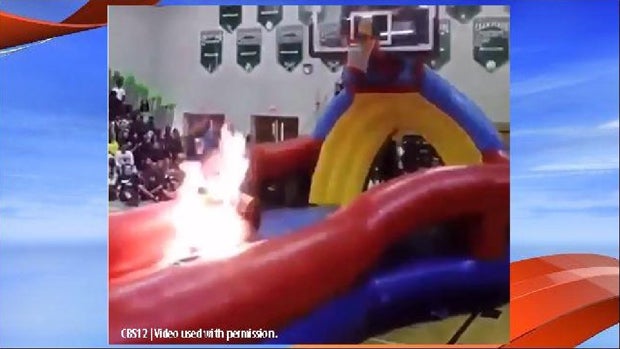 A stuntman accidentally sets himself on fire at Atlantic High School in Delray Beach, Florida, on March 17, 2016, in this image capture from video obtained by CBS West Palm Beach affiliate WPEC-TV. 