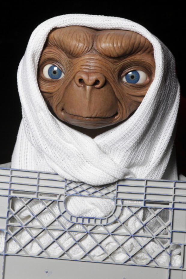 Studio Artist Rides E.T. Figure To Its New Home In The Film Experience At Madame Tussauds New York For The Anniversary of Universal Studios/Amblin Entertainment's "E.T. The Extra-Terrestrial" 