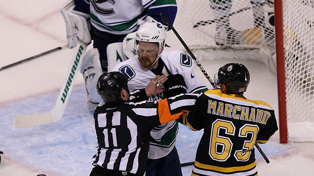 Brad Marchand, Daniel Sedin - Vancouver Canucks v Boston Bruins - Game Six 