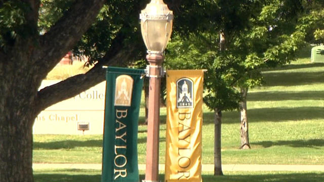 A lamppost decorated with Baylor University banners is seen on the school's campus in Waco, Texas. 