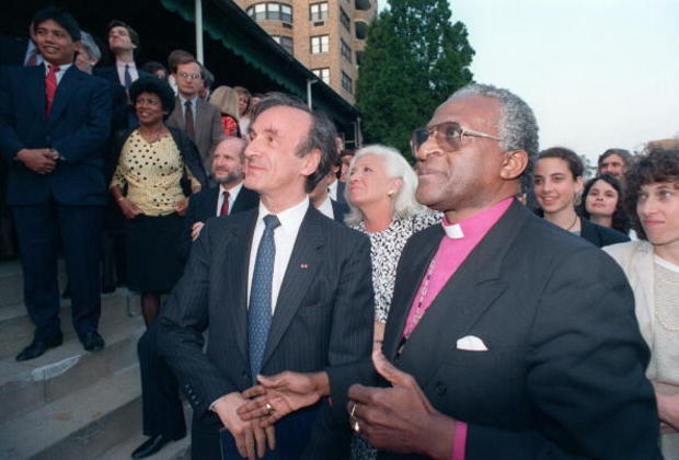 Elie Wiesel and South African Archbishop Desmond Tutu prepare to leave the Third Annual Human Rights Award Dinner held in Washington to honor Wiesel on May 11, 1988. 