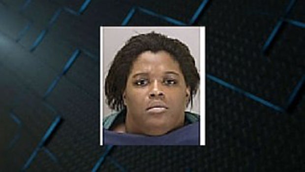 ​Dee'Andra McGhee is seen in an undated booking photo the Summit County Prosecutor's Office in Ohio provided to CBS Cleveland affiliate WOIO-TV. 