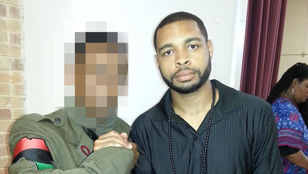 ​Micah Xavier Johnson, right, is seen in a photo obtained by CBS News. 