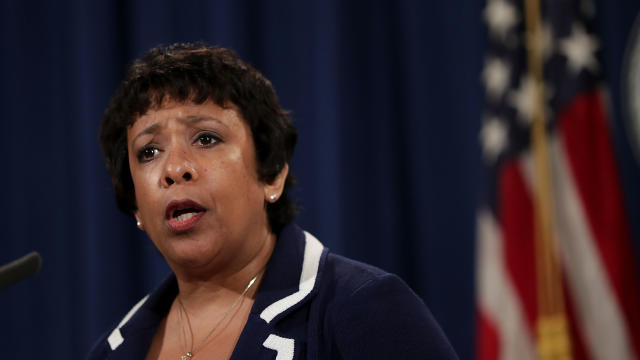 U.S. Attorney General Loretta Lynch speaks to members of the media as she makes a statement on the Dallas killing of police officers July 8, 2016, at the Justice Department in Washington. 