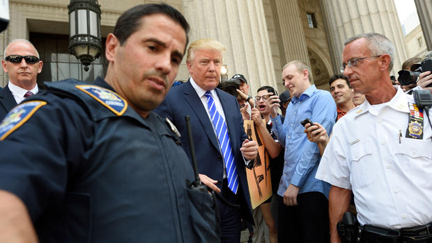 Presidential candidate Donald Trump exits New York Supreme Court after morning jury duty Aug. 17, 2015, in New York. 