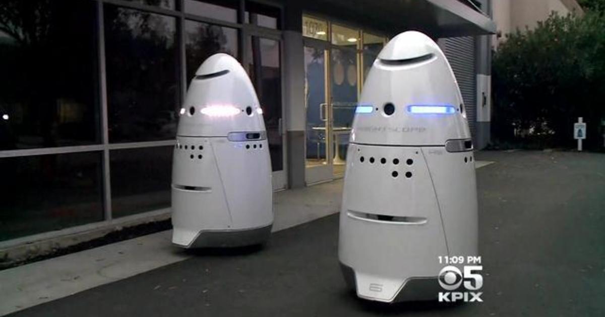 Robot cop at mall child - News
