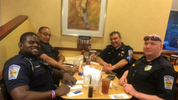 ​A group of police officers dine at an Eat'n Park restaurant in Homestead, Pennsylvania, in this picture provided to CBS Pittsburgh station KDKA-TV. 