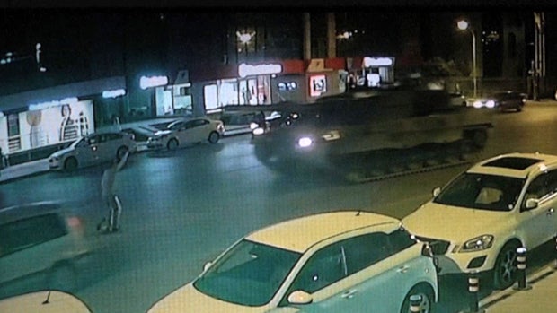 ​A tank approaches a man in the street in Istanbul, Turkey, during an attempted military coup on July 15, 2016. 