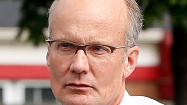 Dentist Walter Palmer, who returned to his practice Sept. 8, 2015, in Bloomington, Minn., arrives back to his office following a lunch break. 