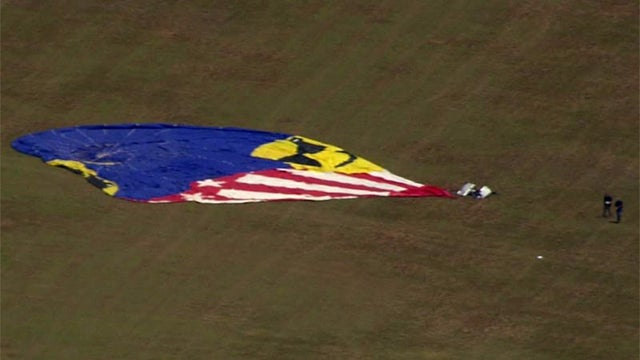 An image capture of aerial footage shows a hot air balloon that crashed in Central Texas on July 30, 2016. 