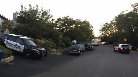 ​Crews work the scene after a deadly shooting at a home in Mukilteo, Washington, on July 30, 2016. 