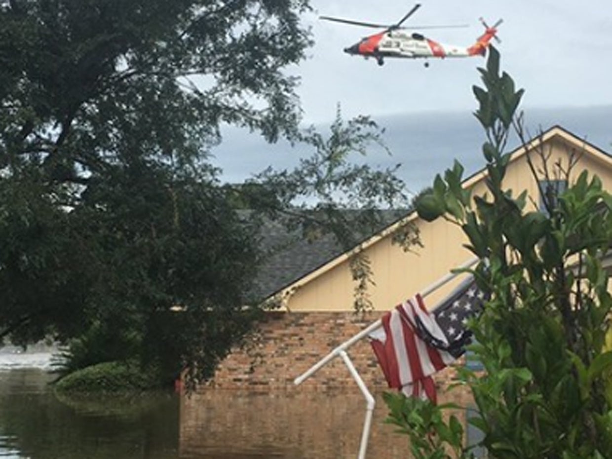 Tens of thousands rescued from historic Louisiana flooding - CBS News