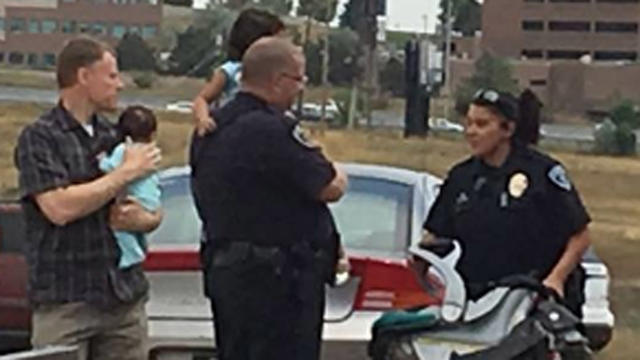 kidnap-9-cropped-of-cops-holding-two-kidnapped-kids.jpg 