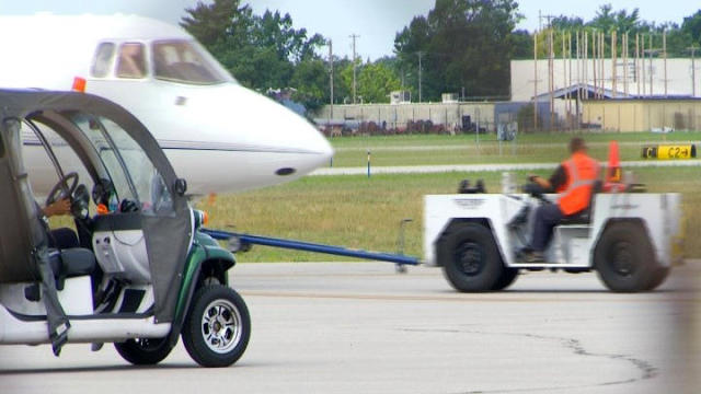 Crews work at Cherry Capital Airport in Traverse City, Michigan. 