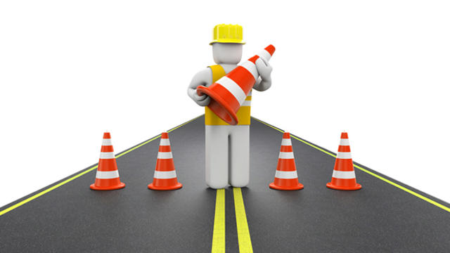repairman-with-traffic-cones.jpg 