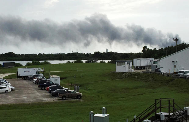 Smoke rises from a SpaceX launch site Sept. 1, 2016, at Cape Canaveral, Fla. NASA said SpaceX was conducting a test firing of its unmanned rocket when a blast occurred. 