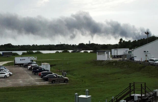 Smoke rises from a SpaceX launch site Sept. 1, 2016, at Cape Canaveral, Fla. NASA said SpaceX was conducting a test firing of its unmanned rocket when a blast occurred.