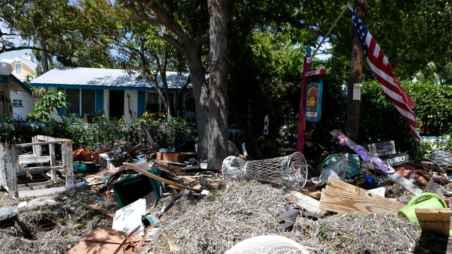 Debris is left outside of the Faraway Inn, left behind by the winds and storm surge associated with Hurricane Hermine, which made landfall overnight in the area on Sept. 2, 2016, in Cedar Key, Florida. 
