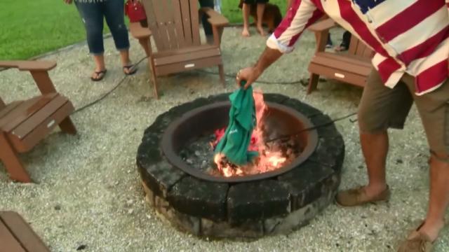 Fans burn Dolphins jerseys to protest anthem kneeling