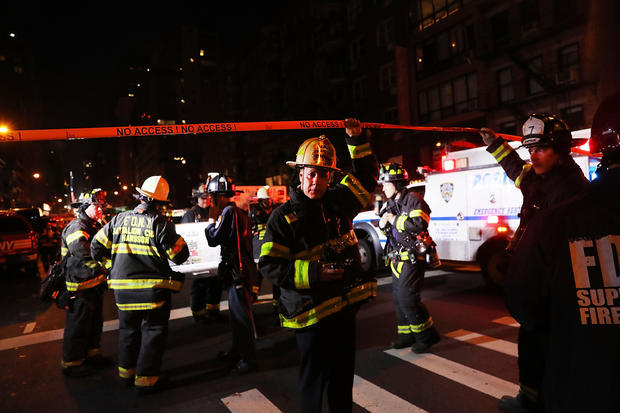 Police, firefighters and emergency workers gather at the scene of an explosion in Manhattan on Sept. 17, 2016, in New York City. The evening explosion at 23rd Street in the popular Chelsea neighborhood injured over two dozen people. 