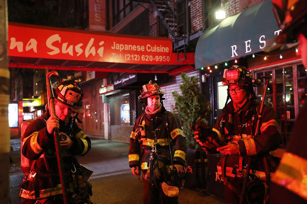 Police, firefighters and emergency workers gather at the scene of an explosion in Manhattan on Sept. 17, 2016, in New York City. The evening explosion at 23rd Street in the popular Chelsea neighborhood injured over two dozen people. 