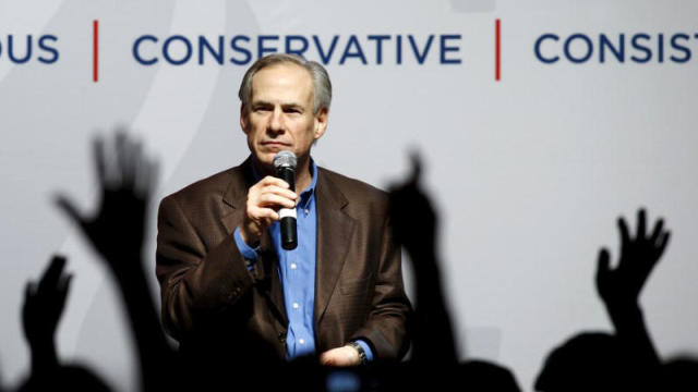 Texas Gov. Greg Abbott speaks at a campaign rally for Republican presidential candidate Ted Cruz in Dallas, Texas, Feb. 29, 2016. 