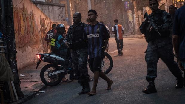 Brazilian security forces raid Rio slums ahead of World Cup 