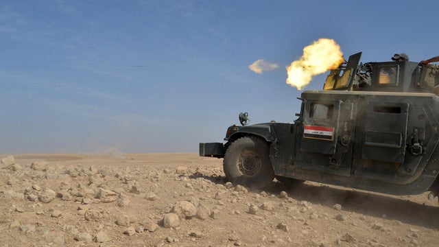 An Iraqi security forces military vehicle is seen during an operation to attack militants with the Islamic State of Iraq and Syria in Mosul, Iraq, Oct. 21, 2016. 