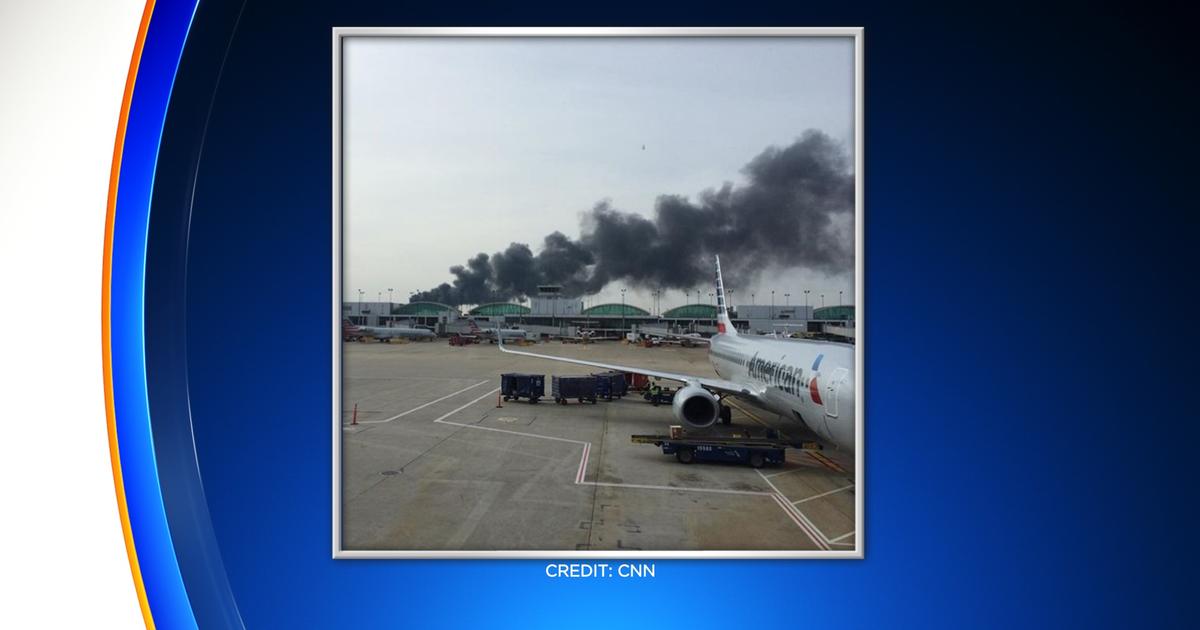 Plane Catches Fire On Runway At Chicago's O'Hare International Airport
