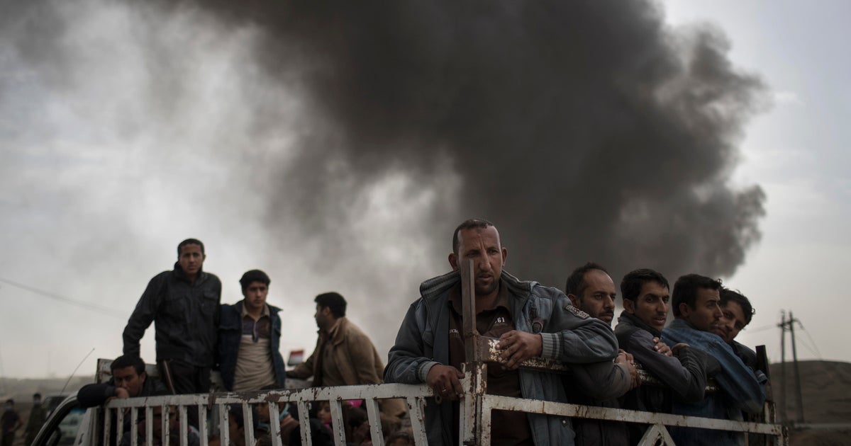 ISIS Iraq Mosul advance stalled by weather and militant holdouts - CBS News