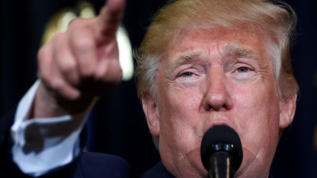 Republican presidential nominee Donald Trump attends a campaign rally at the Florida State Fairgrounds in Tampa, Florida, Nov. 5, 2016. 